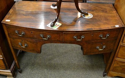 Lot 1314 - A 1920s/30s inlaid mahogany bow fronted kneehole dressing table&nbsp