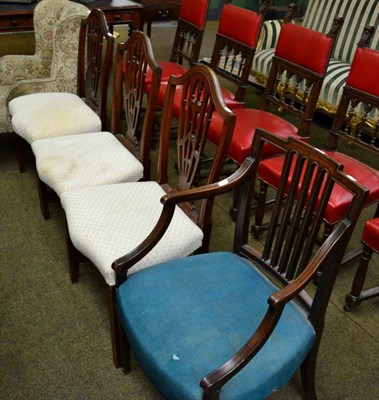 Lot 1347 - A set of three 19th century shield back dining chairs together with an open armchair of similar...