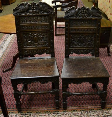 Lot 1351 - A pair of Victorian oak hall chairs