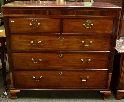 Lot 1356 - A 19th century mahogany four height chest of drawers, the frieze fitted with a hidden drawer