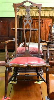 Lot 1357 - A late 19th/early 20th century mahogany high back open armchair