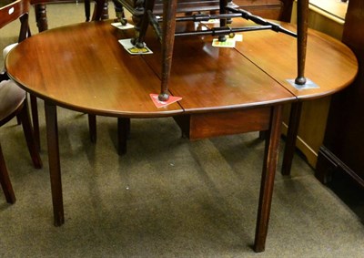 Lot 1358 - A Victorian mahogany music stool; together with a set of four mahogany dining chairs (5)