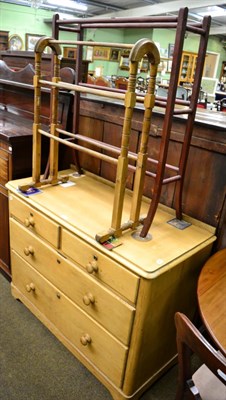 Lot 1360 - A Victorian pine three height chest of drawers together with two towel rails