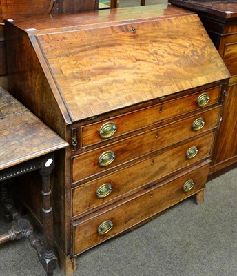 Lot 1362 - A 19th century mahogany bureau