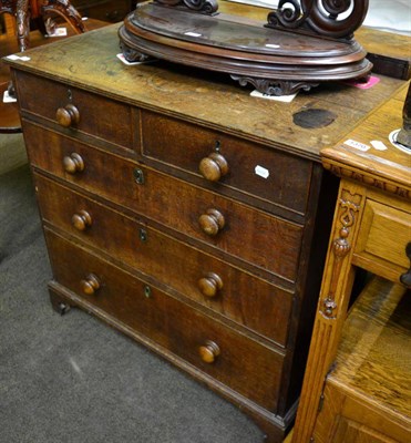 Lot 1371 - A Continental oak four height chest of drawers