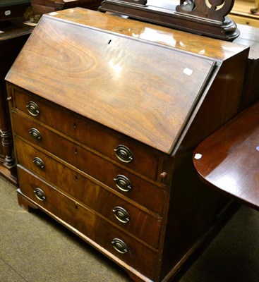 Lot 1375 - A George III mahogany bureau