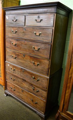 Lot 1390 - A George III mahogany chest on chest, dentil moulded cornice above two short and six long...