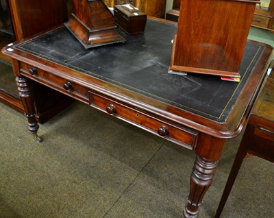 Lot 1397 - A William IV mahogany library table, with leather inset top