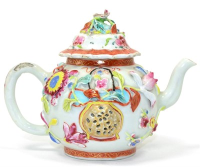 Lot 5 - An 18th century Chinese teapot and cover with applied decoration