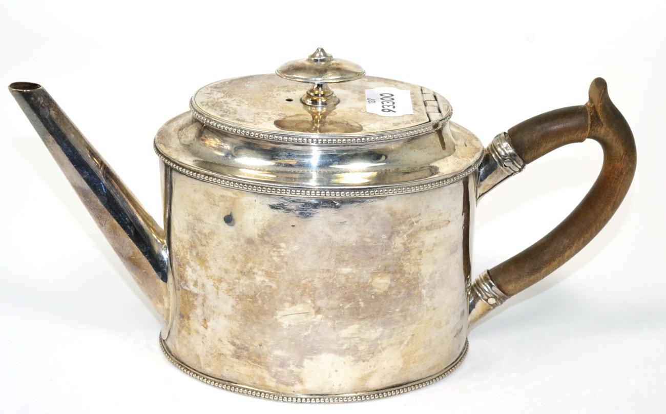 Lot 9 - ~ A Georgian silver teapot