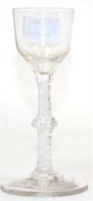 Lot 12 - An 18th century opaque twist wine glass