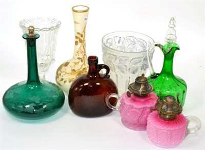 Lot 26 - ~ Opaque pink glass oil lamps; Mary Gregory style green glass claret jug; gilt and opaque glass...