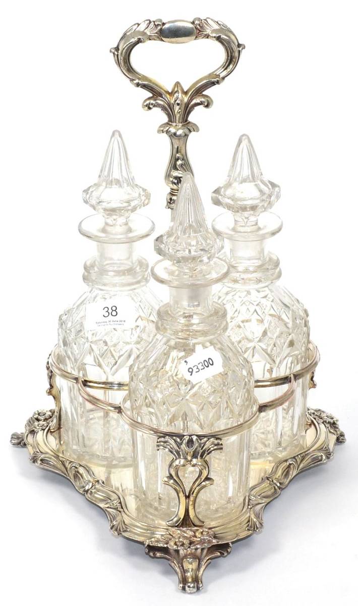 Lot 38 - ~ Three bottle silver plated tantalus