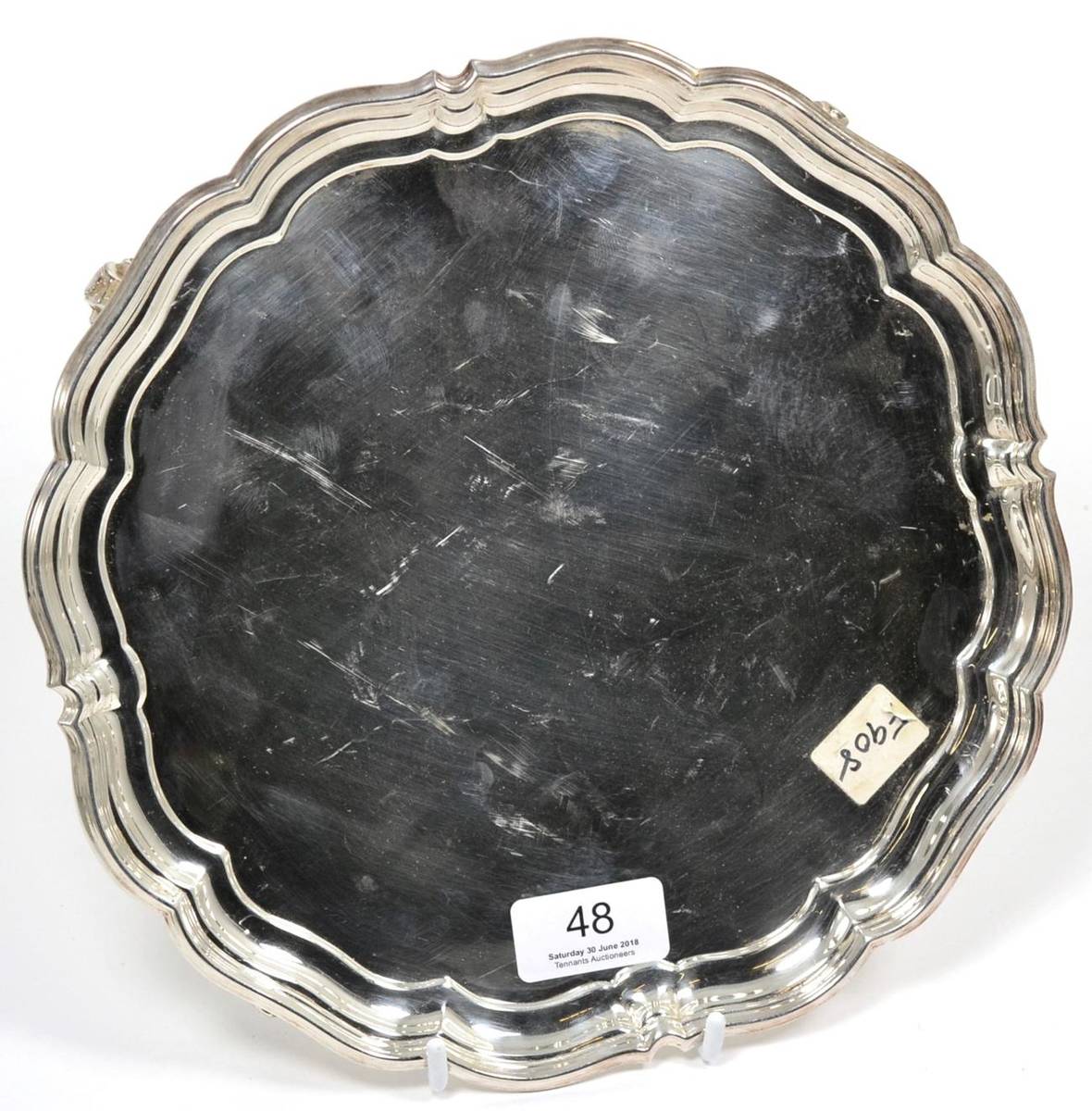 Lot 48 - ~ A shaped circular silver salver, Sheffield 1943, 25.5cm diameter, 19.8ozt