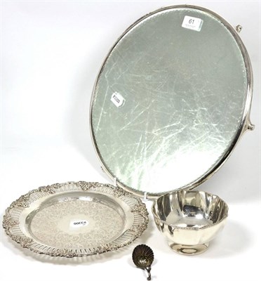 Lot 61 - ~ A group of silver plate comprising a mirrored plateau, pedestal bowl, pierced dish and a...