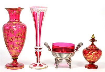 Lot 67 - ~ A Victorian overlay ruby glass trumpet vase, two gilt pieces of ruby glass and a cranberry...