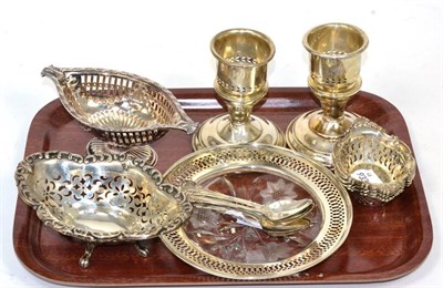 Lot 162 - ~ A set of Burke's sterling pieced dishes, sterling spoons, a pair of sterling candlesticks,...