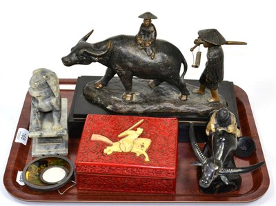 Lot 168 - ~ A late 19th century ivory mounted cinnabar lacquer box and cover, a carved wooden figure of a...