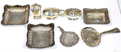 Lot 184 - An Art Deco silver three piece condiment set, Goldsmiths & Silversmiths, London 1931; two...