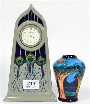 Lot 216 - A modern Moorcroft Peacock Parade mantel clock, boxed; and a modern Moorcroft Moonlight Sonata vase