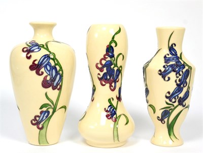 Lot 224 - Three Moorcroft Bluebell Harmony pattern vases by Kerry Goodwin, each 16cm (3)