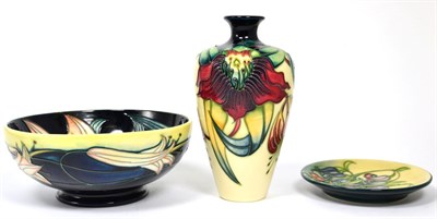 Lot 228 - A Moorcroft Anna Lily vase, 16cm, a Moorcroft Spring Flowers coaster and a Moorcroft Pink...