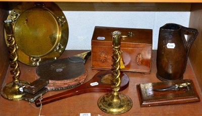 Lot 253 - ~ A card passer, bellows, a tea caddy, a leather jack, Art Nouveau brass tray etc (one shelf)