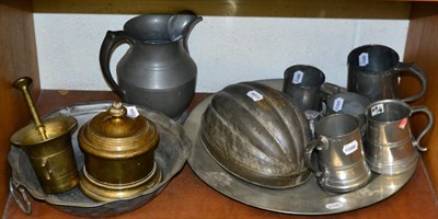 Lot 254 - ~ Bronze pestle and mortar, together with a quantity of pewter including tankards etc