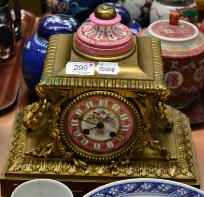 Lot 299 - A French gilt metal and porcelain striking mantel clock