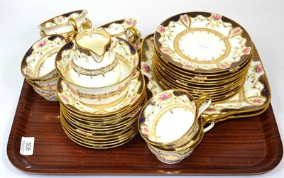 Lot 308 - A Wedgwood rose decorated twelve place setting teaset with gilding