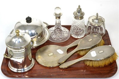 Lot 318 - Three silver backed dressing table items; a silver topped caster; a silver topped preserve jar etc