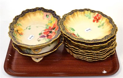 Lot 333 - A Nautilus china dessert service, circa 1880, decorated with flowers, comprising a pair of oval...