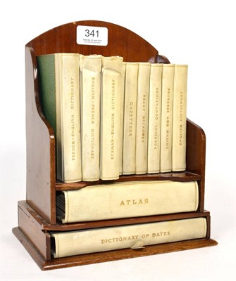 Lot 341 - Miniature reference library circa 1906, with part vellum bindings, housed in a miniature