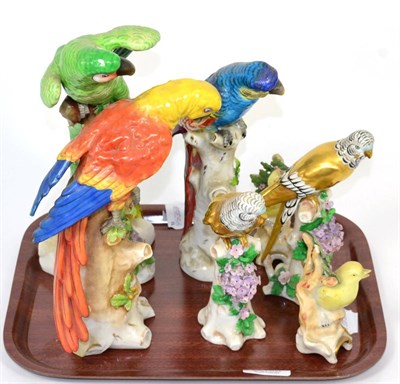 Lot 346 - Seven Continental porcelain parrot and other bird models