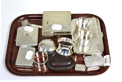 Lot 354 - A collection of silver including vinaigrette, lidded box, sovereign and note case, cigarette...