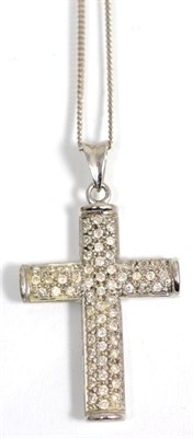 Lot 365 - A 9 carat white gold pavé set diamond cross pendant, total estimated diamond weight 0.65 carat...