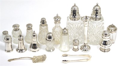 Lot 376 - A pair of silver topped cut glass casters; various silver peppers; silver topped examples etc