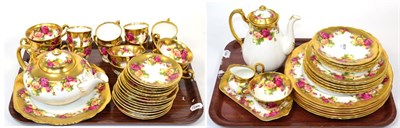 Lot 387 - ~ A Royal Chelsea 'Golden Rose' tea and coffee service, on two trays