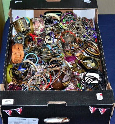 Lot 428 - A large quantity of costume jewellery, including bangles, bracelets and various necklaces, contents