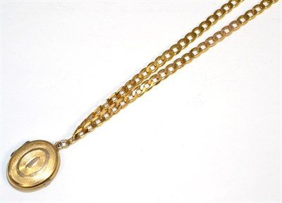 Lot 435 - A Cuban link chain, length 49cm, stamped '750', suspending an engine turned locket pendant