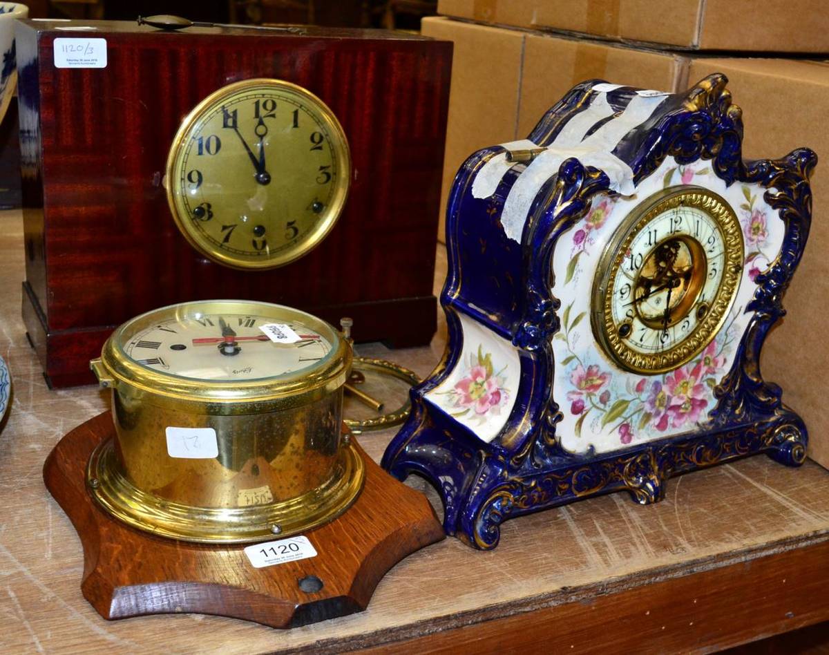 Lot 1120 - Pottery striking Ansonia mantel clock; Art Deco chiming mantel clock; and a ships type battery...