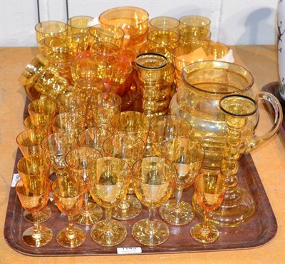 Lot 1145 - Two trays of amber lustre glass