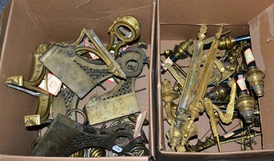 Lot 1157 - ~ Quantity of curtain pole brackets and rings, and a pair of twin-light wall sconces, together with