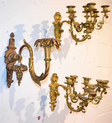 Lot 1174 - ~ A pair of French ormolu six-light wall lights and a single wall sconce