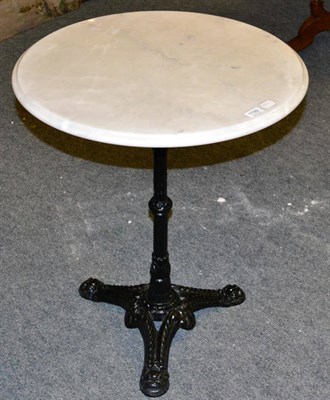 Lot 1192 - A reproduction circular marble top conservatory table; a brass column lamp; and four terracotta...