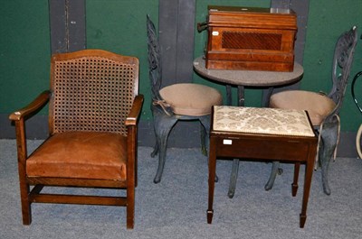 Lot 1205 - Metal garden table and two matching chairs, together with an oak framed cane back occasional chair