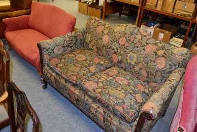 Lot 1209 - Mahogany framed hump back two seated cottage sofa; together with a similar two seater sofa