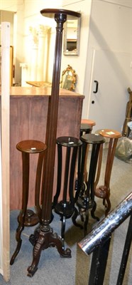 Lot 1222 - ~ A set of six of tripartate plant stands (three lacquered) and a tall mahogany fluted pedestal