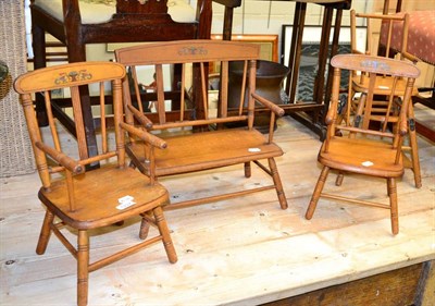 Lot 1227 - Four pieces of early 20th century dolls furniture comprising a three piece suite and a...