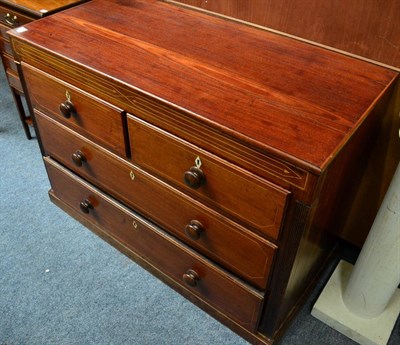 Lot 1258 - A 19th century three height chest of drawers